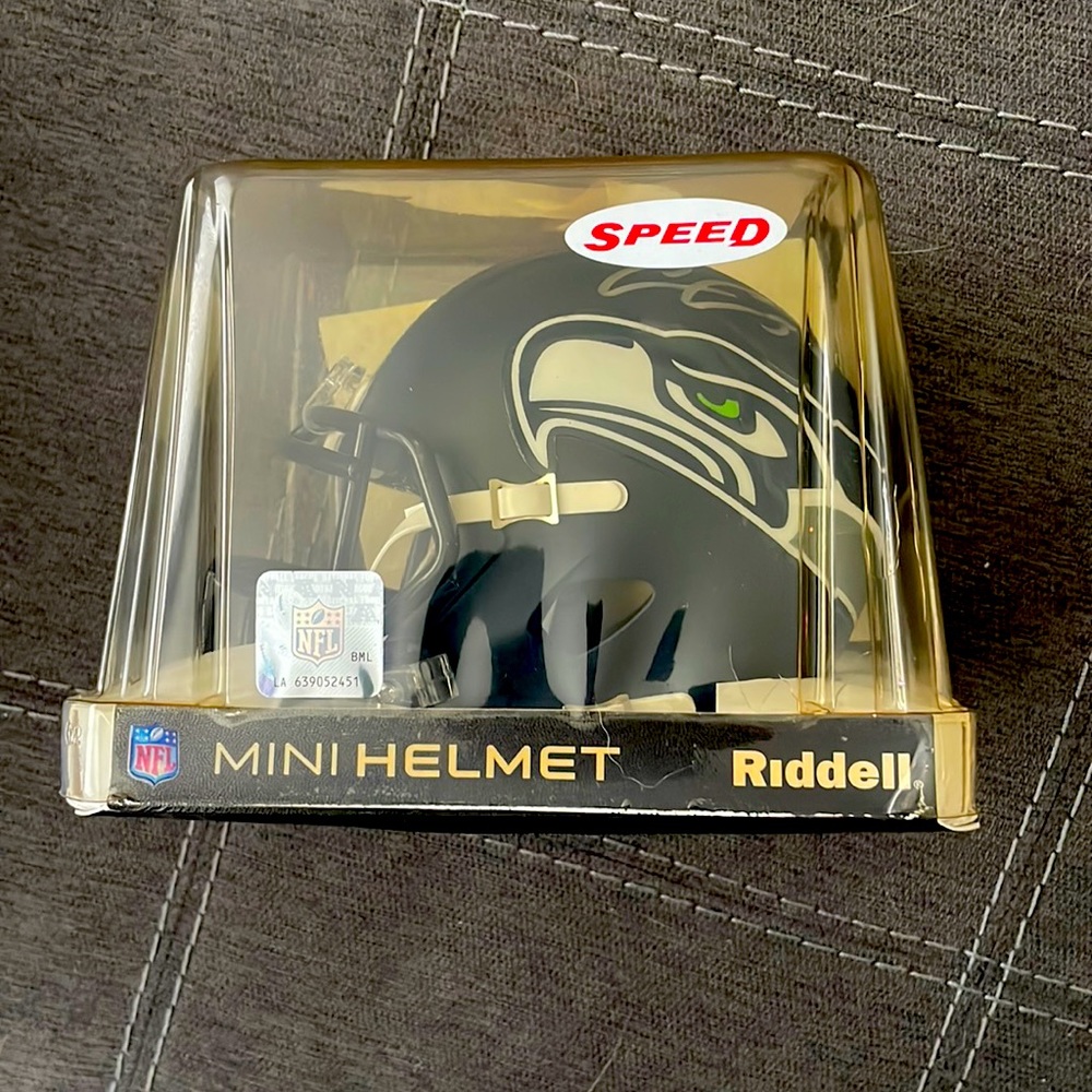 Mini Seahawks helmet signed by Chris Carson with Certificate of Authenticity.